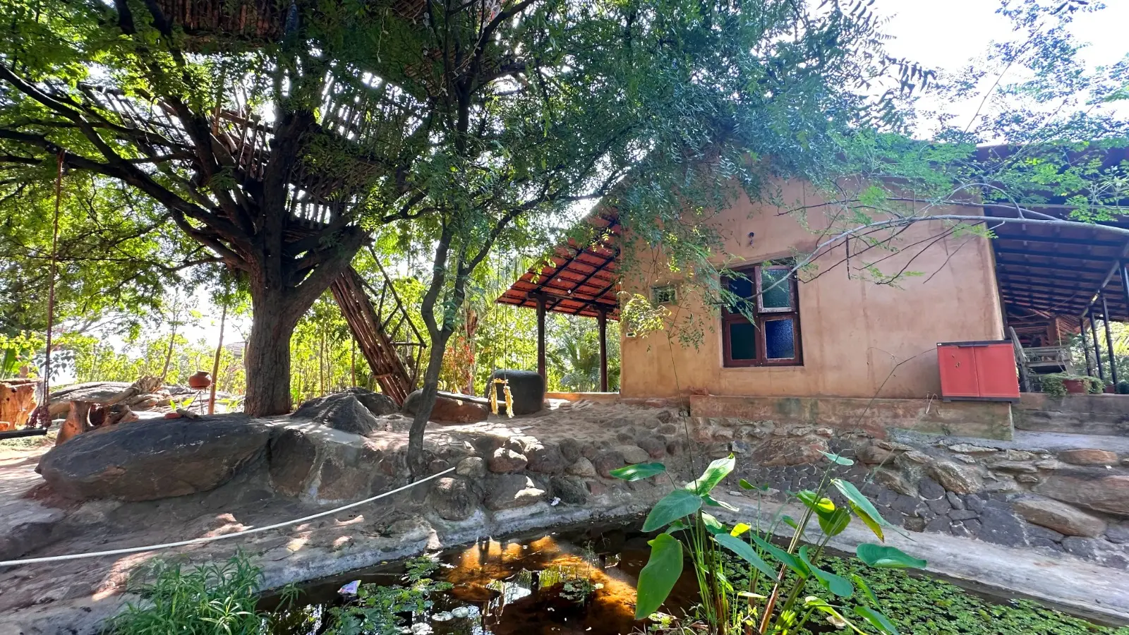 kilukka mud house and tree