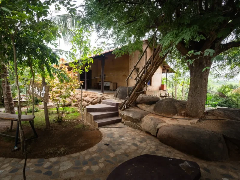 Beautiful walkway and sitting area at Mud House- Kilukka Farms